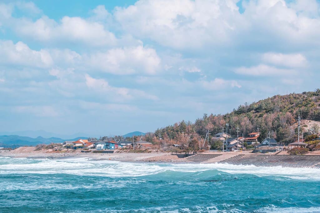 The rugged Japanese coastline and blue ocean