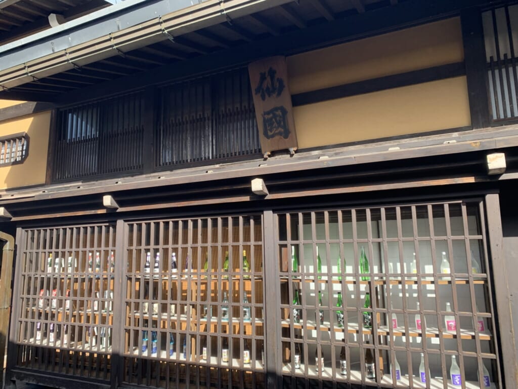 JApanese sake brewery storefront with wood lattice