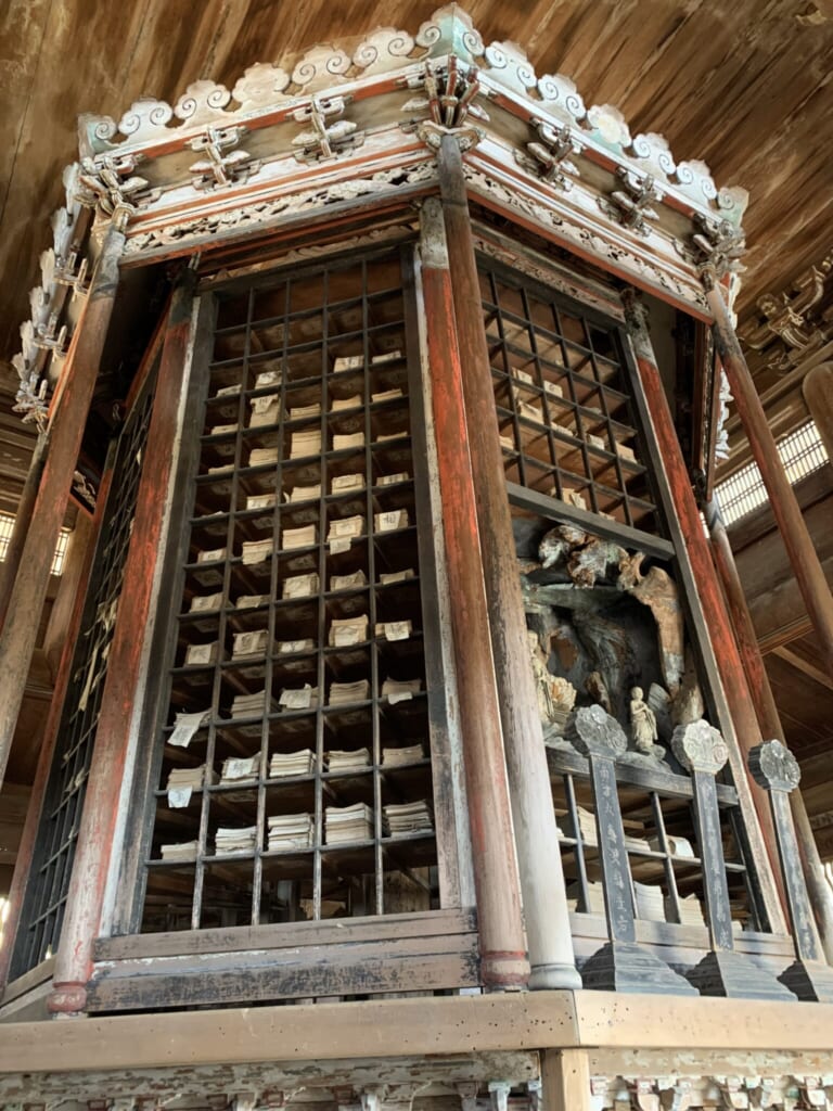 wooden rinzo containing sutras