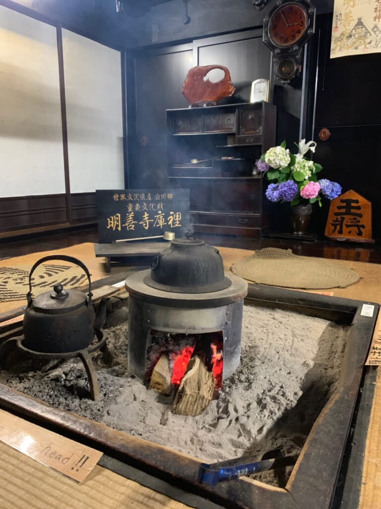 close-up of smoking irori with burning wood in traditional JApanese house in Gifu, Japan