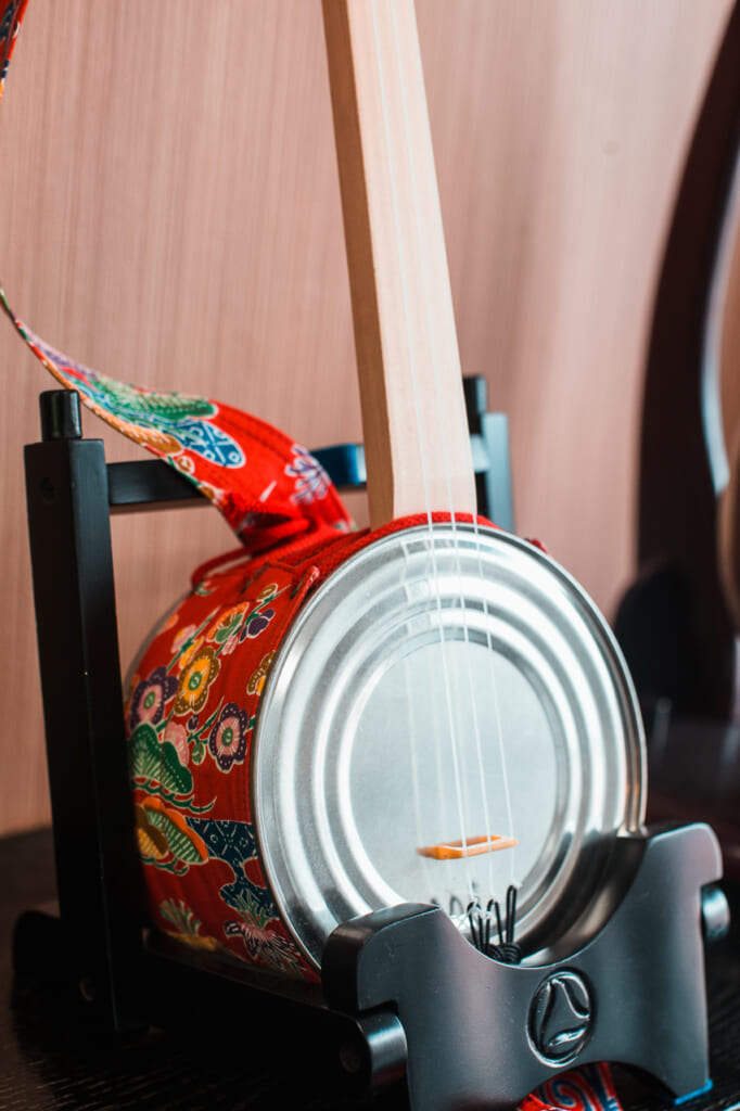 detail of a kankara sanshin, a japanese instrument