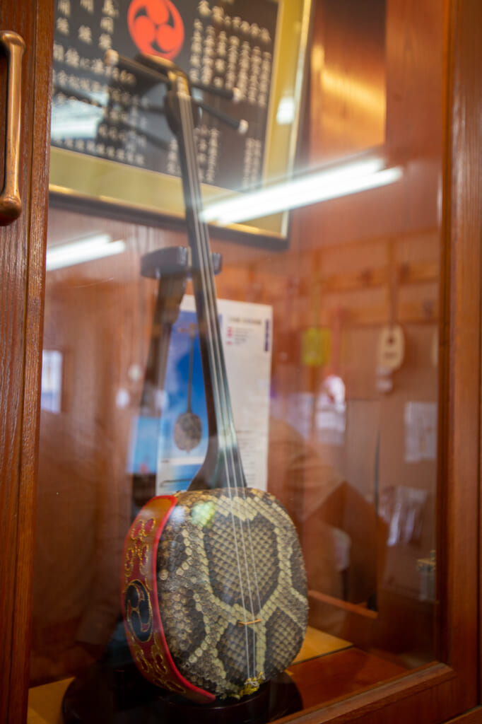An antique sanshin in traditional Japanese store
