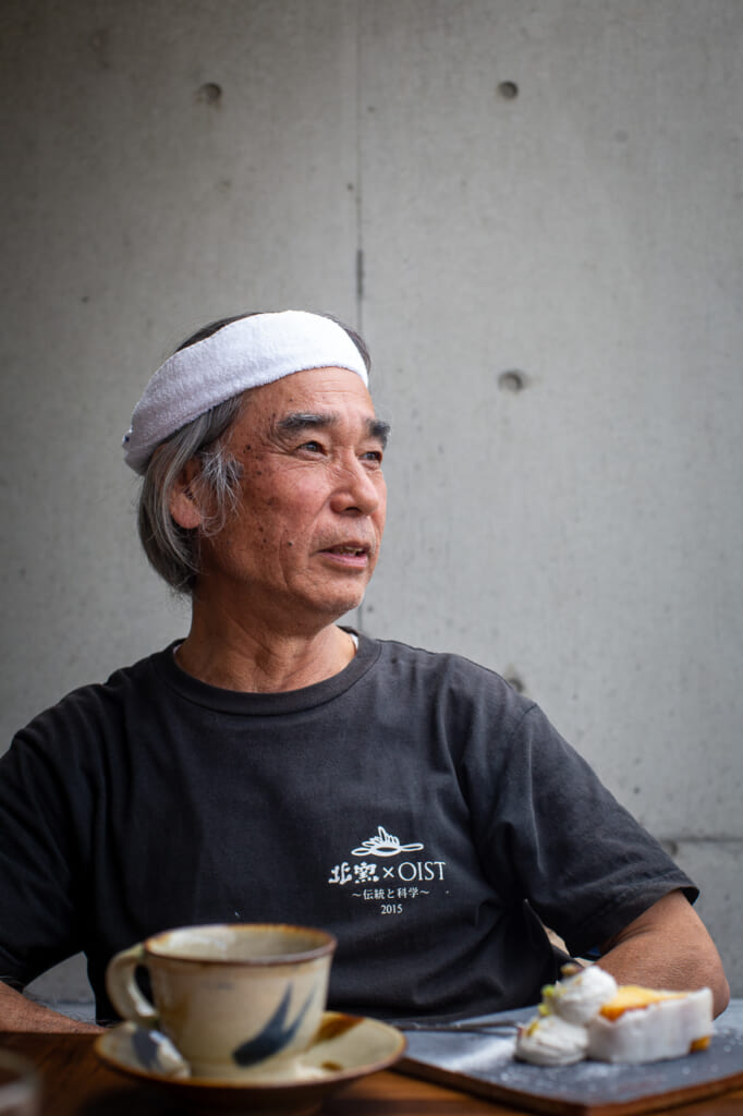 kyoshi matsuda in a coffee shop in okinawa, Japan