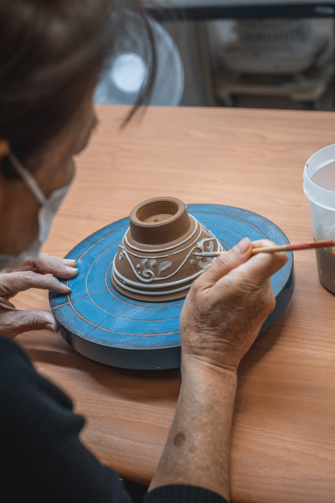 white design in a ceramic bowl in Okinawa, Japan