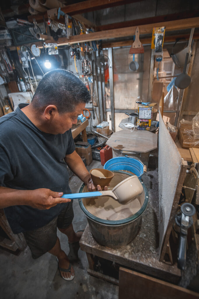 Nakama's brother working in the workshop in Okinawa, Japan