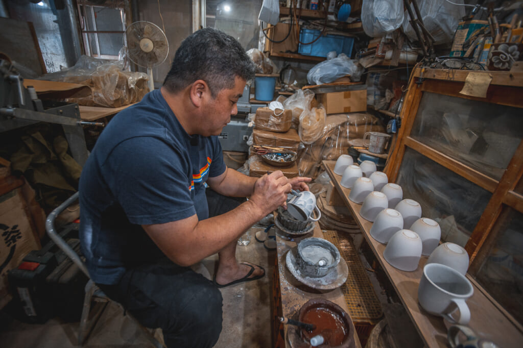 Nakama-san working in his workshop in Okinawa, Japan