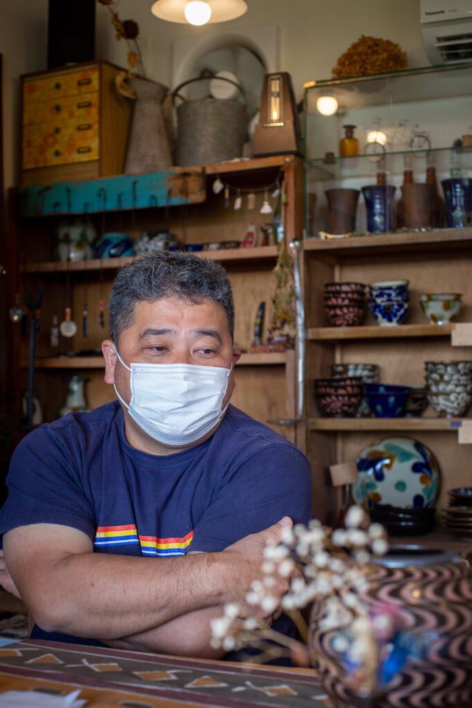 portrait of a Isao Nakama in his shop in Okinawa