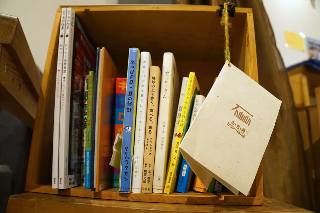 books displayed in a square box in Japan
