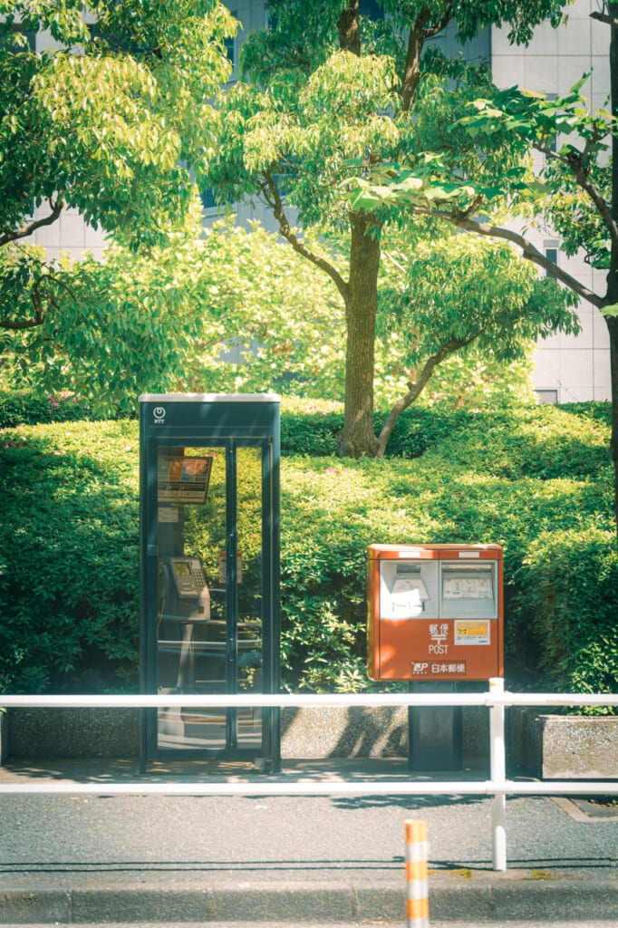 A telephone box, where you usually start a phone call as moshi moshi