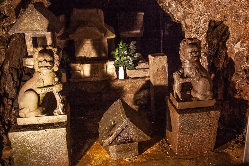 guardian dog statues in cave on Enoshima, Japan