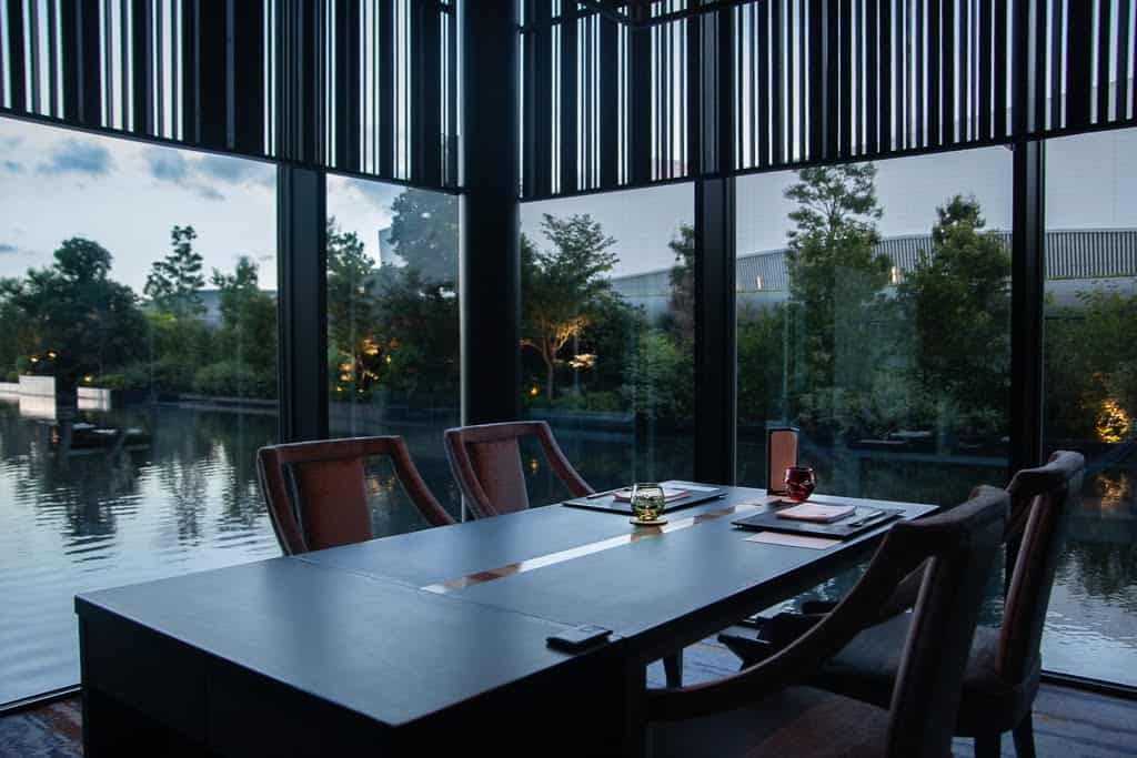 restaurant table in corner room over water in Yokohama, Japan