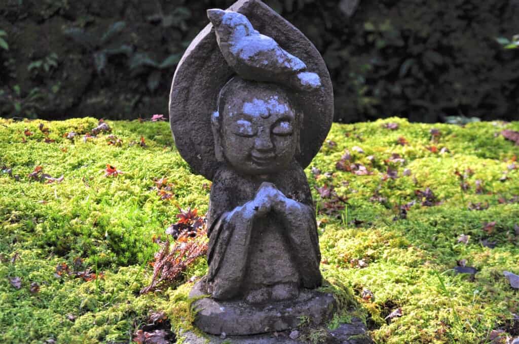 small stone jizo  statue in kyoto