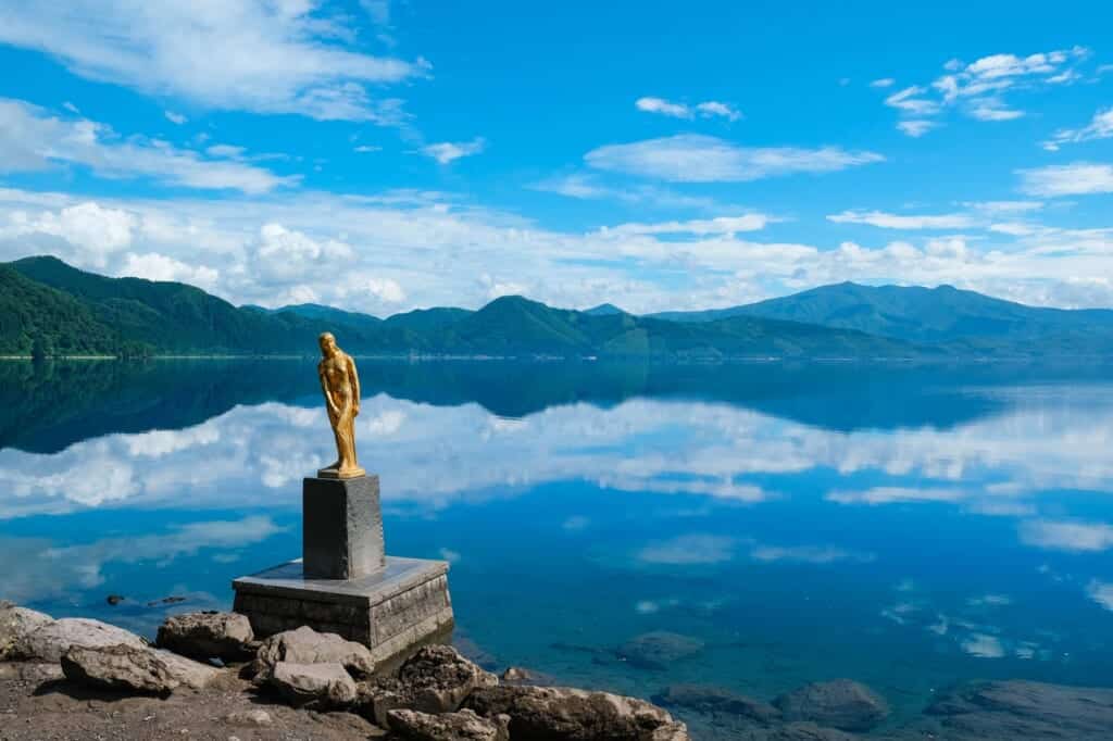 Gold Tatsuko statue at Lake Tazawa in Tazawako, Semboku