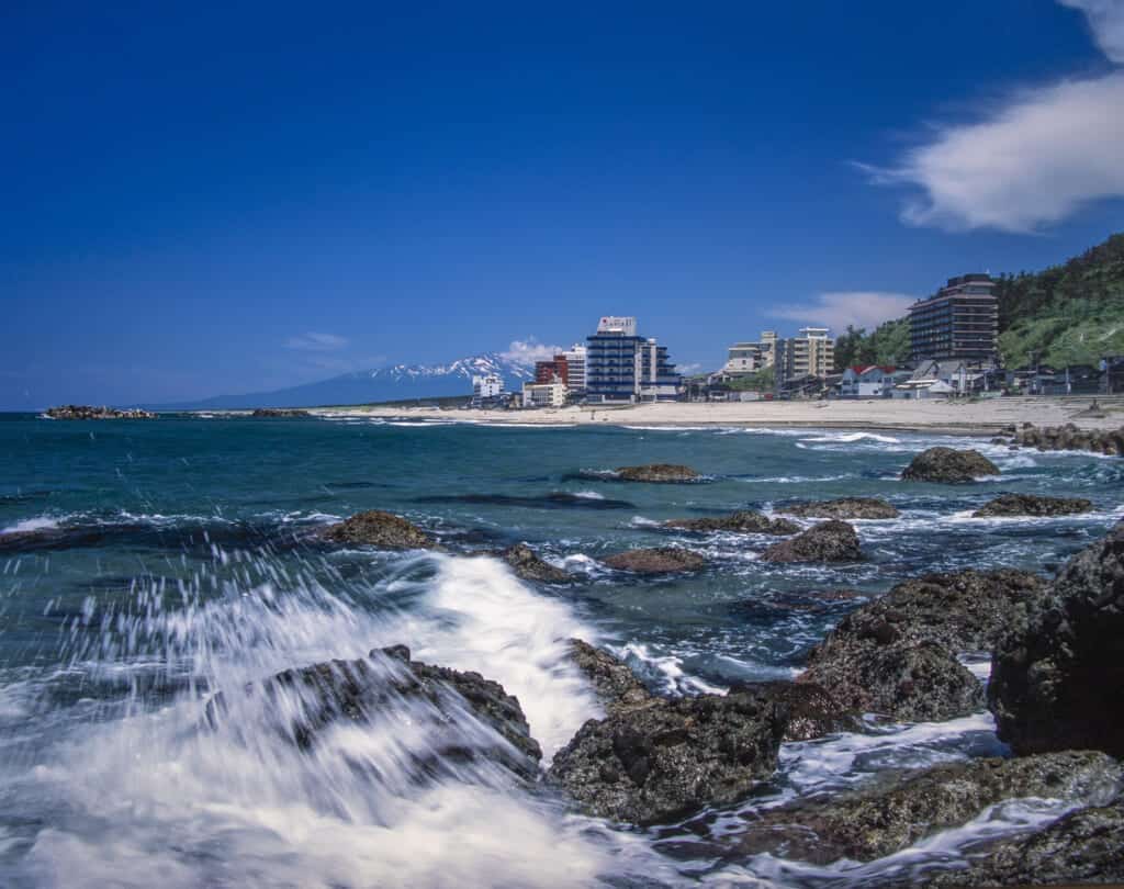 A picture of the ocean and beach near Tsuruoka, Japan
