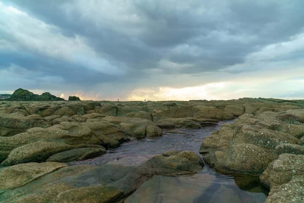 People fishing on the Senjojiki Coast in Japan