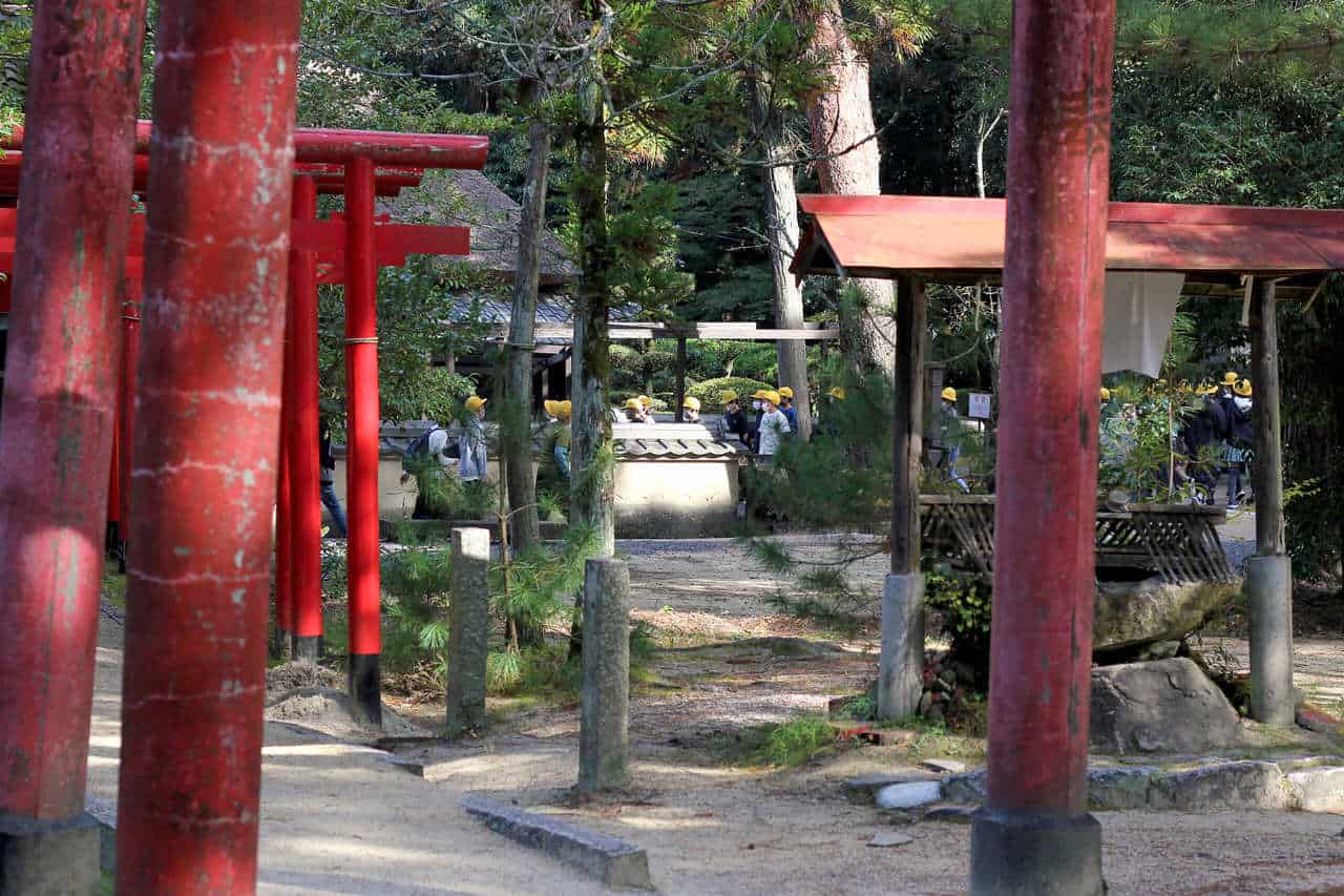 children with yellow hats in japanese ninja museum area