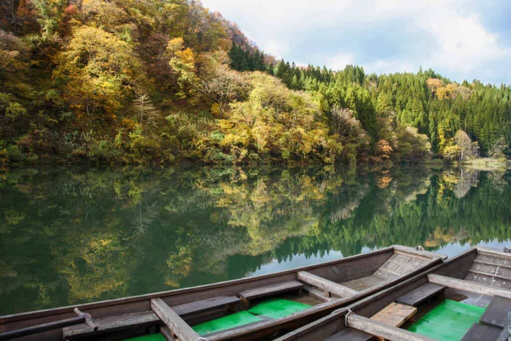 Autumn colors reflection on river in Japan