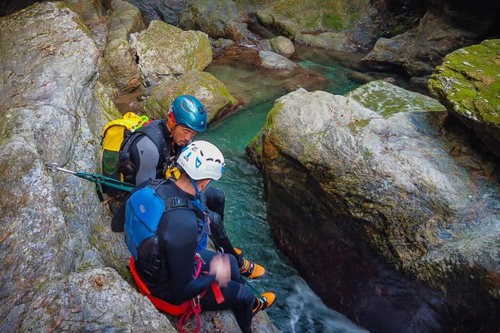 people canyoning in nakatsu gorge, shikoku, japan