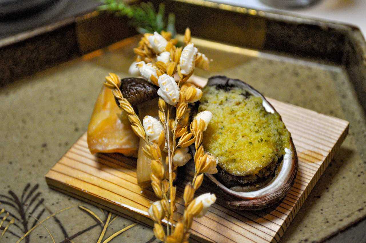 kaiseki meal - abalone with garlic butter and puffed corn
