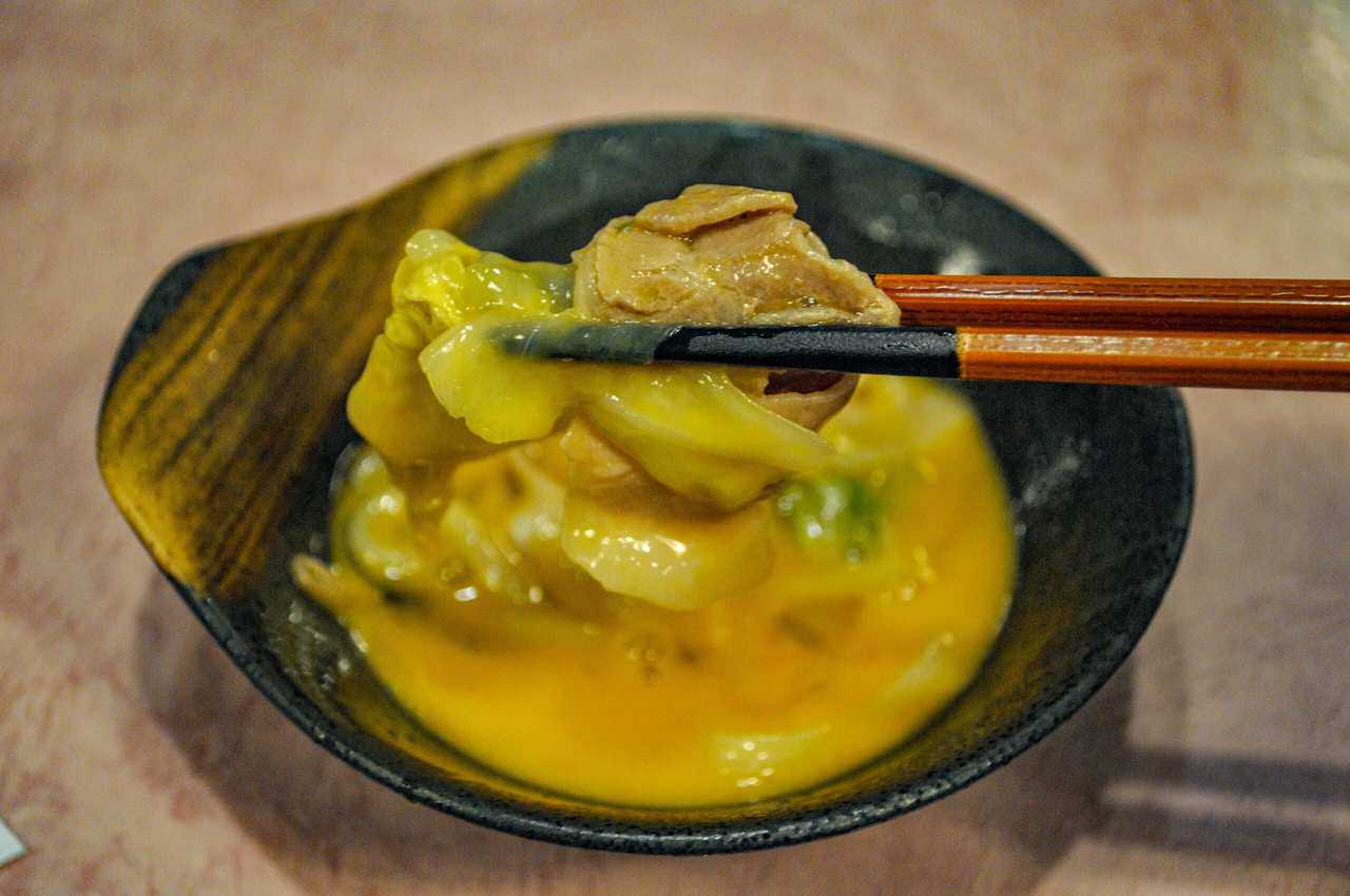 Black pork nabe dipped in egg yolk