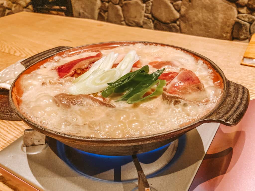 Bandid hot pot with chicken, duck, venison, and vegetables at Kumagera Izakaya