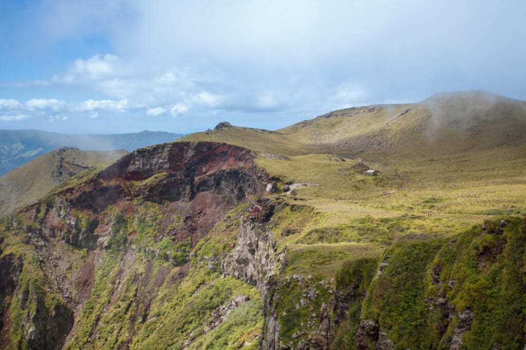 Impressive green cliffs in Mount Aso in Japan