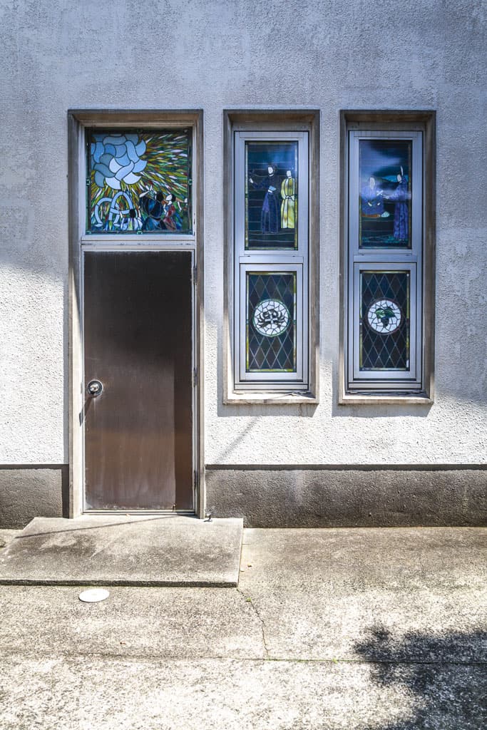 Stain glass windows in cement wall on Fukue Island, Nagasaki