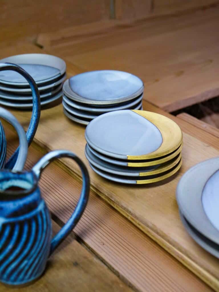 blue and gold painted pottery