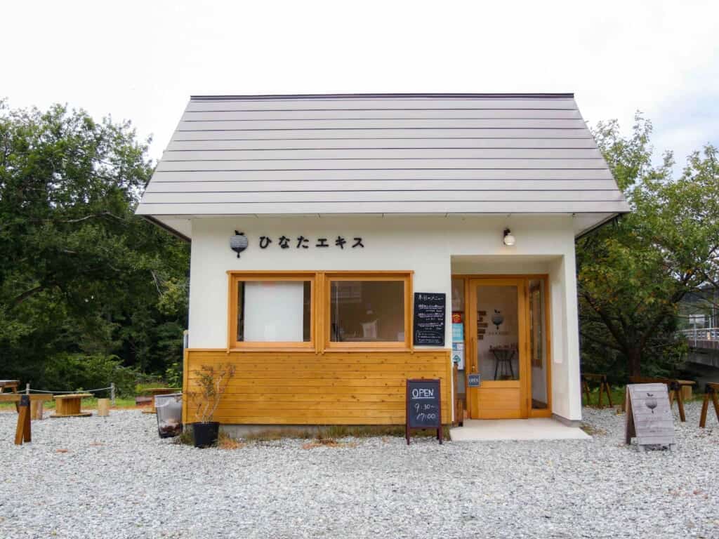 Hinata Ekis building and outdoor seating on the left