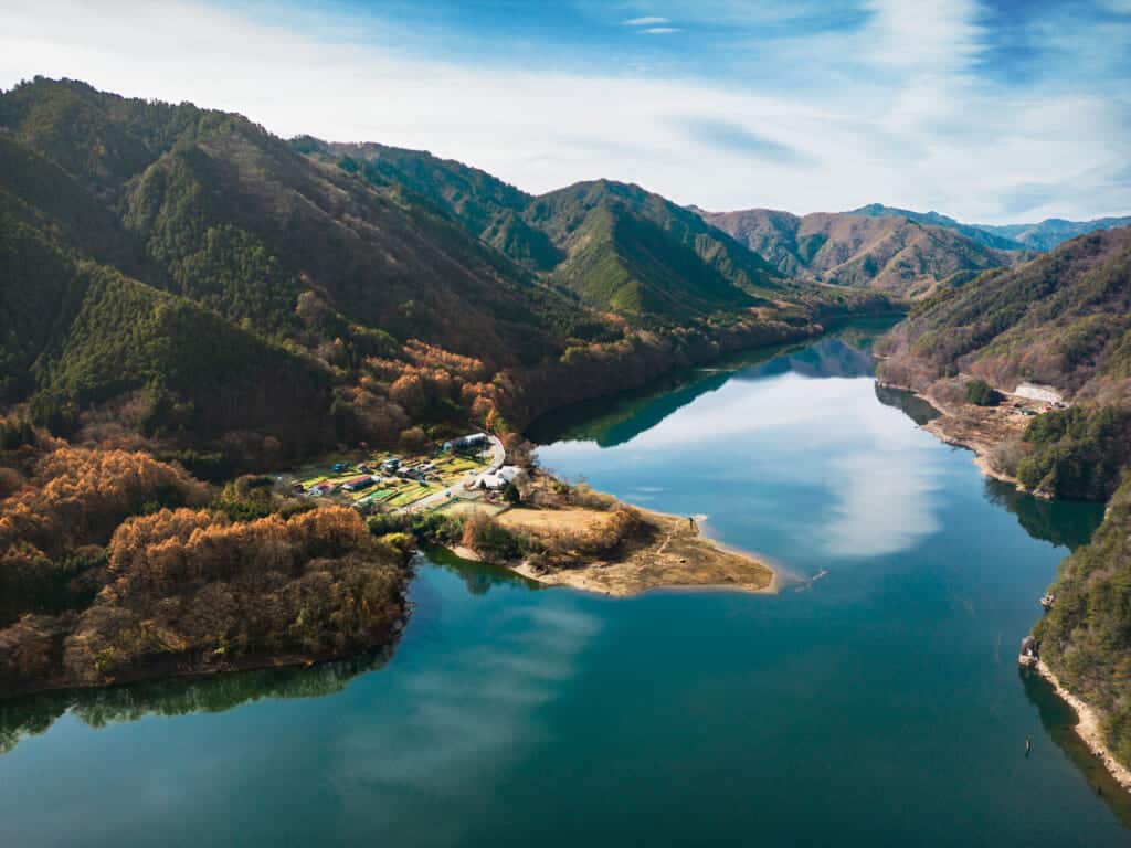 A beautiful view of a blue lake from Mt. Ontake