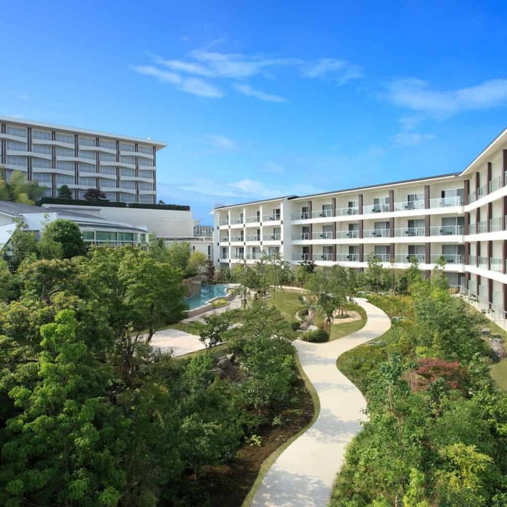 Hotel garden with fountain and trees