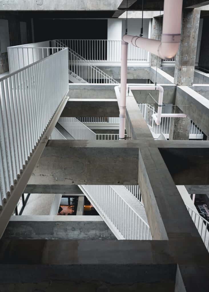 cement stairs and metal railings