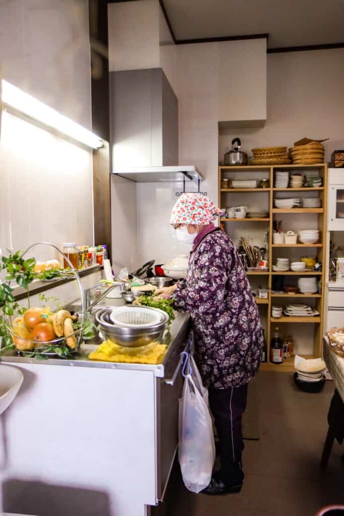 Farm Stay's owner preparing food
