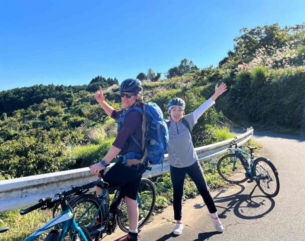 Two people on bicycles in Japan.
