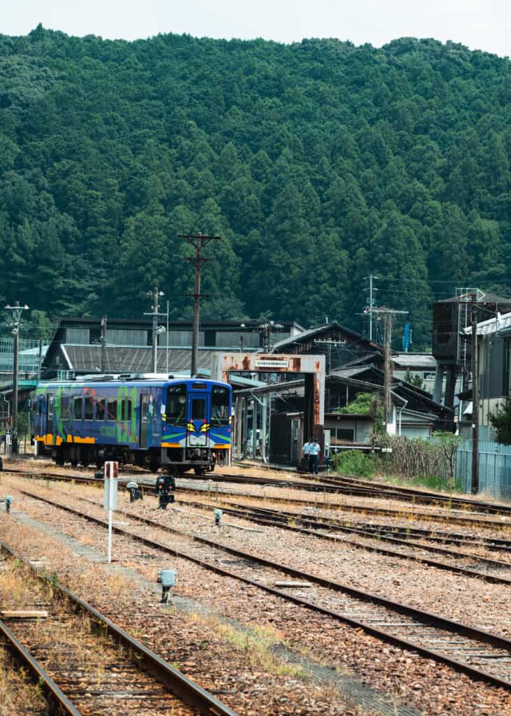 evangelion decorated train on tenhama railway line