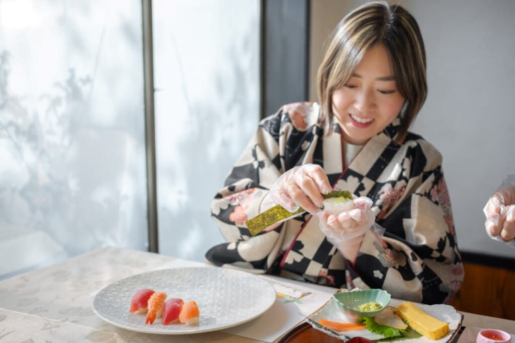 japanese female making sushi