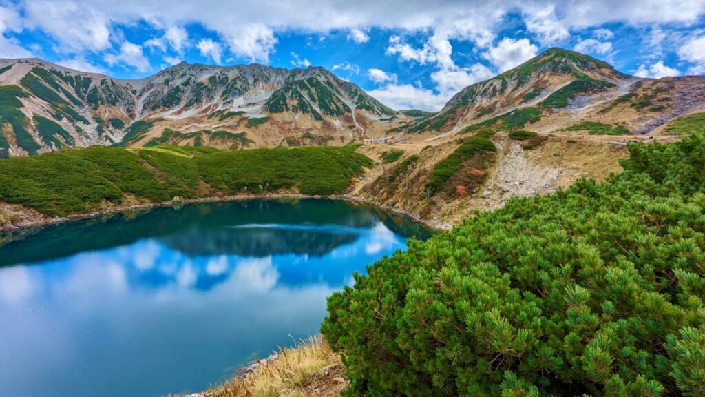 Blue sky reflecting in Mikurigaike in Toyama Prefecture, Japan