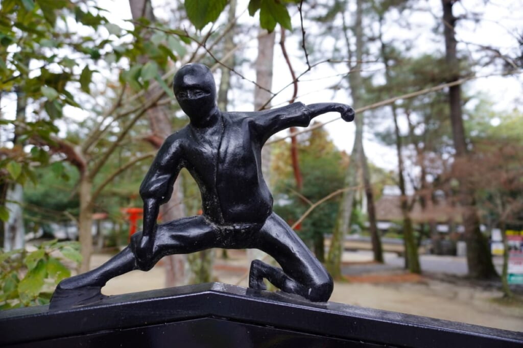 Ninja statue on a sign