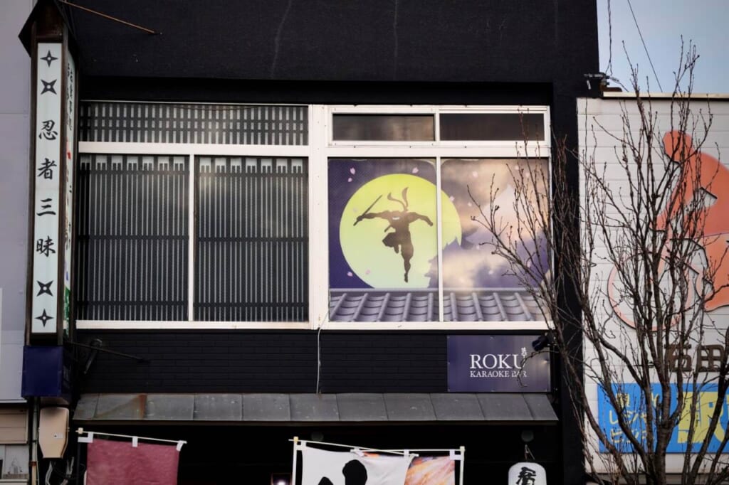 A ninja motif in a window of a restaurant in Japan