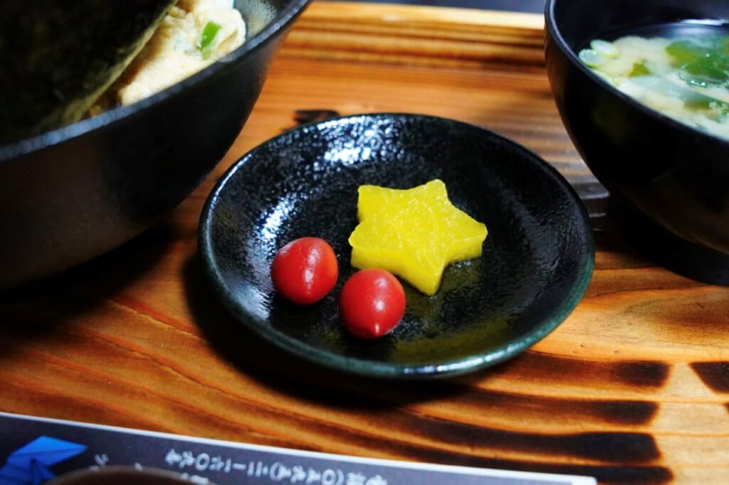 Umeboshi pickled plums and pickled radish at a ninja themed restaurant
