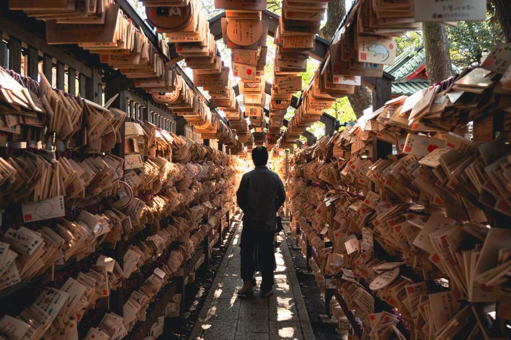 A tunnel of ema prayer boards at Kawagoe Hikawa Shrine