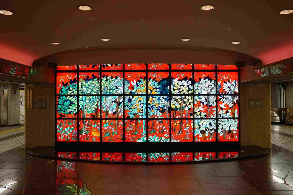 booth-like Metro Ginza Gallery stained glass window
