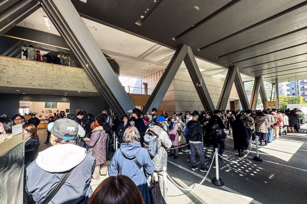 Crowrds queuing outside of Museum of Contemporary Art Tokyo for Ryuichi Sakamoto exhibition