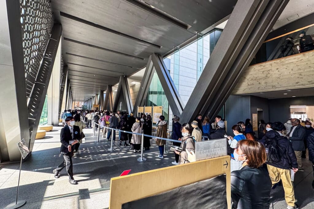 Crowrds queuing outside of Museum of Contemporary Art Tokyo for Ryuichi Sakamoto exhibition