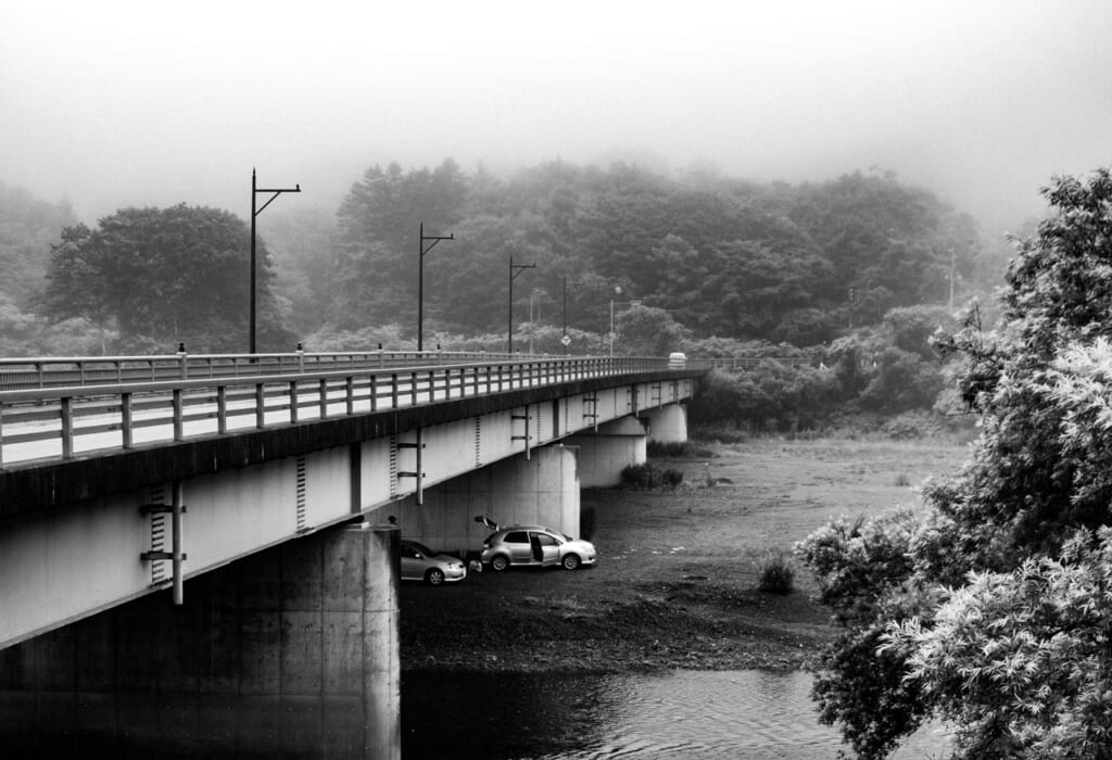 People checking their cars after a driving accident in Hokkaido