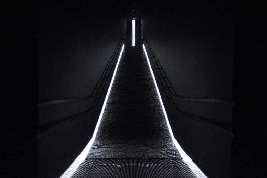 Waterfall of Light Particles at the Top of an Incline - teamLab planets