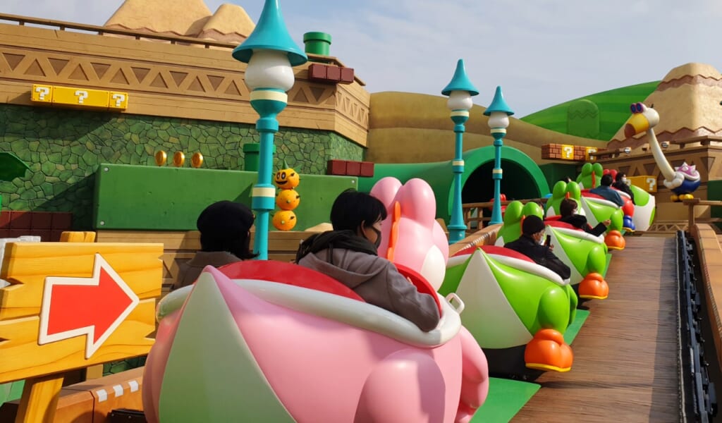 Montez à bord des voitures à l'effigie de Yoshi dans Yoshi’s Adventure