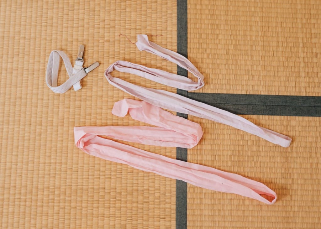 Korin-Gürtel und Koshi-himo.